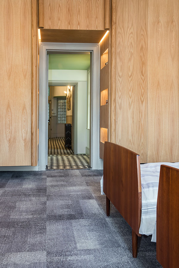 Floating oak and brass storage and cabinets